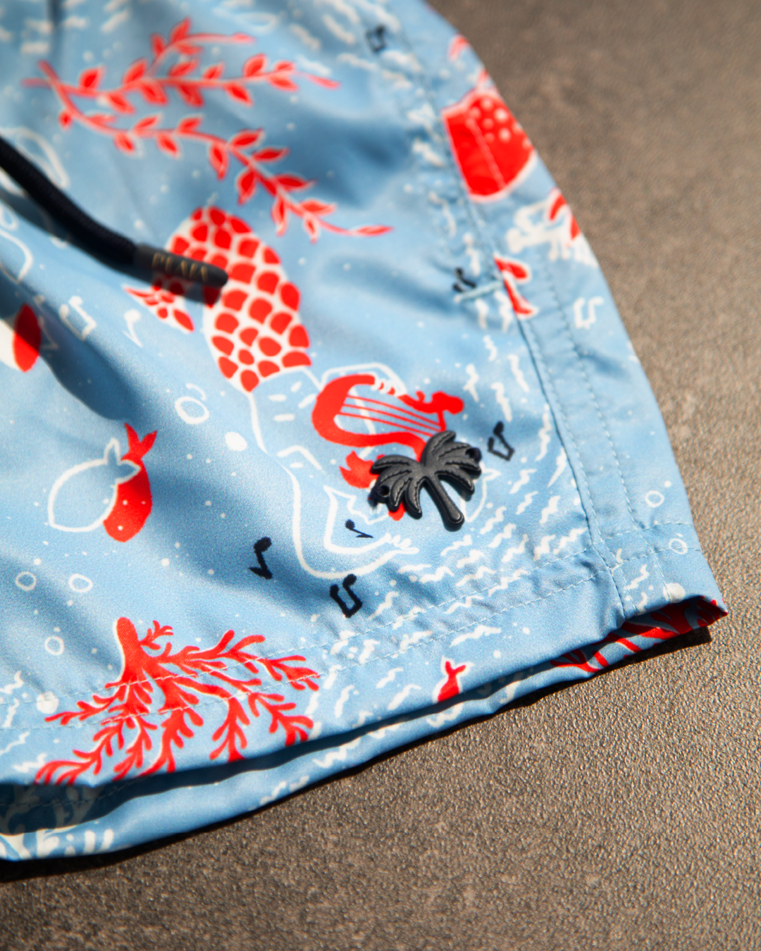 Bolsillo funcional con ojalete en la pantaloneta de baño Creta