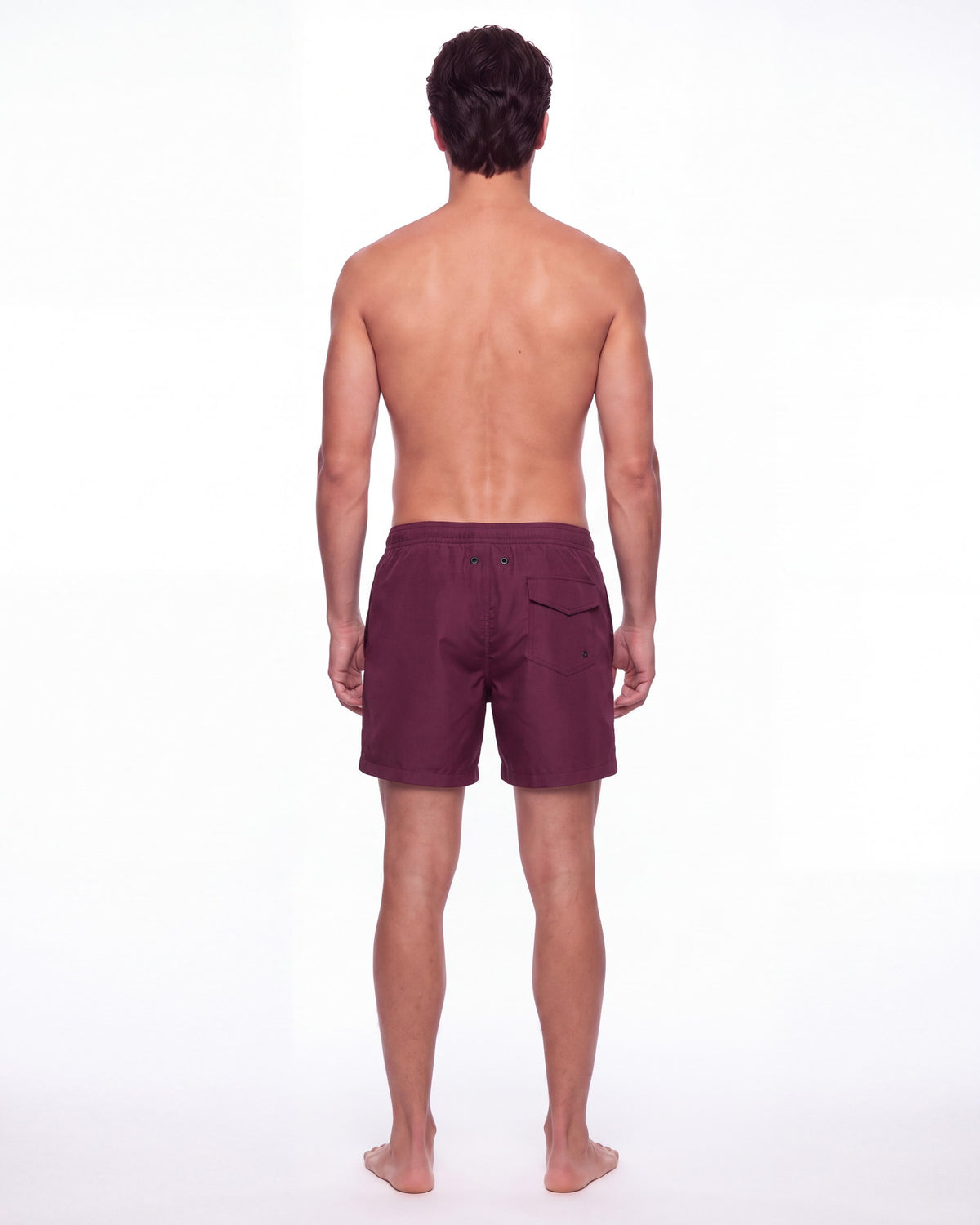 Hombre con pantaloneta de baño MALDIVAS burdeos lisa, de espaldas